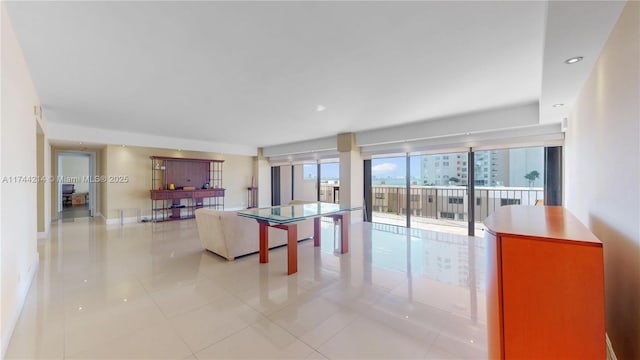 living room featuring light tile patterned flooring