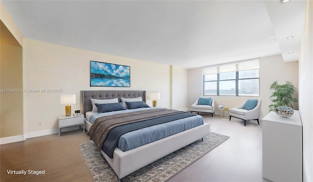 bedroom featuring wood-type flooring