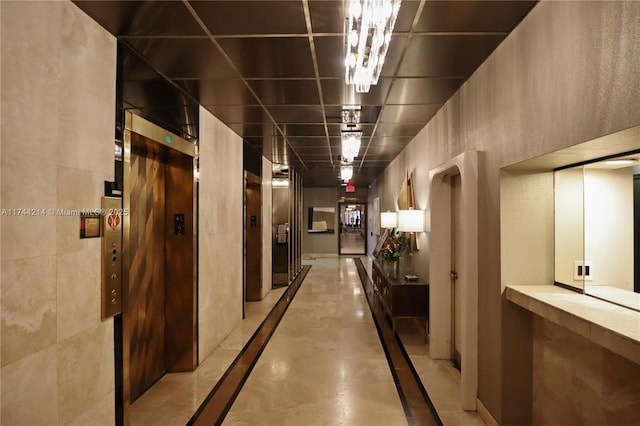 hallway featuring elevator