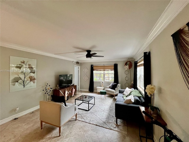 living room with ceiling fan and ornamental molding