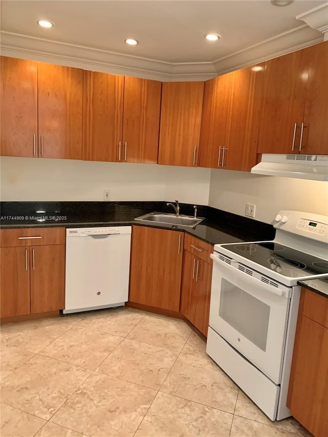 kitchen with crown molding, white appliances, light tile patterned flooring, and sink