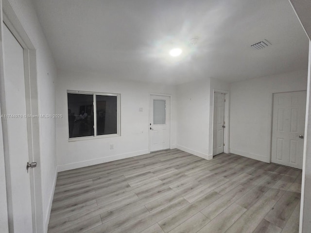 unfurnished bedroom featuring light hardwood / wood-style floors