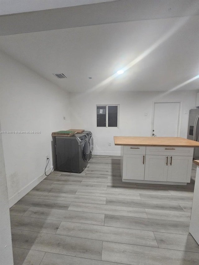 laundry room featuring independent washer and dryer