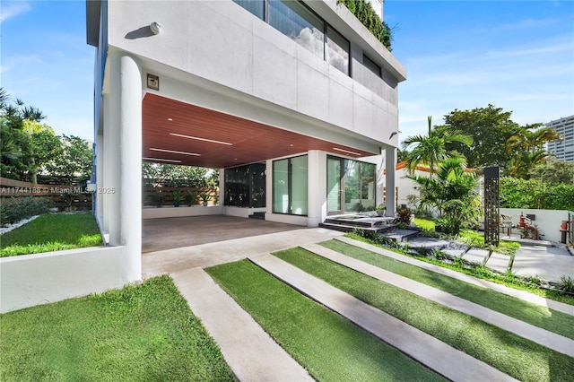 exterior space featuring a carport