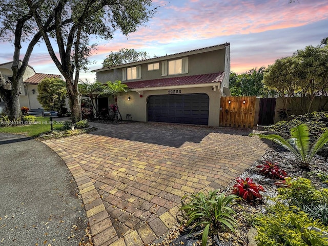 view of front of home with a garage