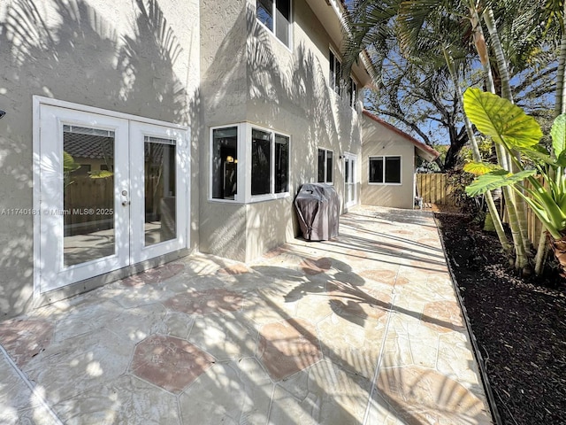 view of patio featuring grilling area and french doors