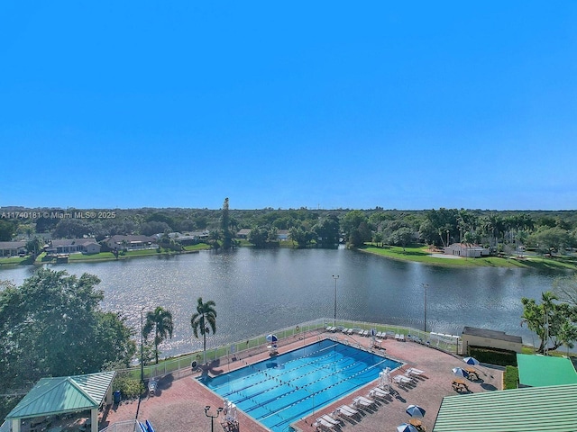 view of pool with a gazebo and a water view