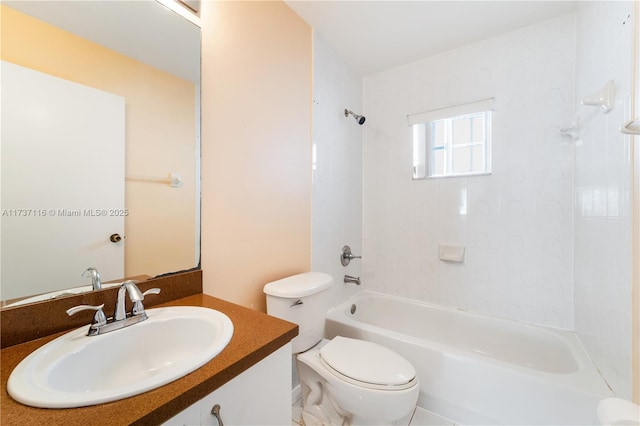 bathroom featuring toilet, washtub / shower combination, and vanity