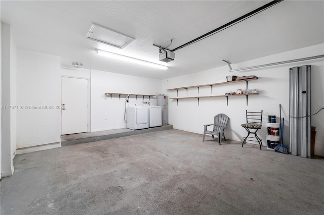 garage with water heater, separate washer and dryer, and a garage door opener