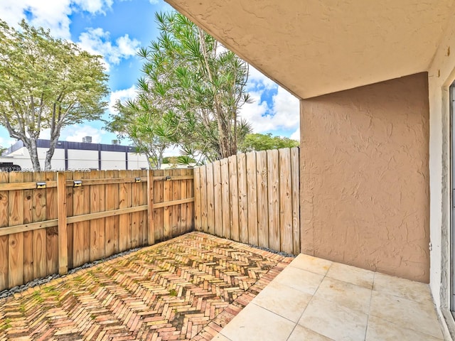 view of patio with fence