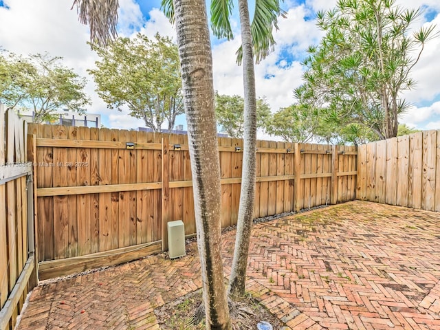 view of patio with fence