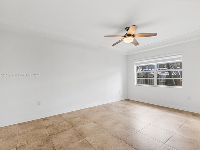 unfurnished room with baseboards, a ceiling fan, and crown molding