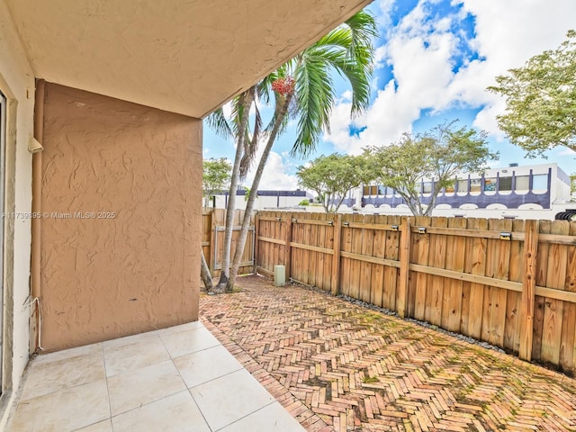 view of patio / terrace with fence