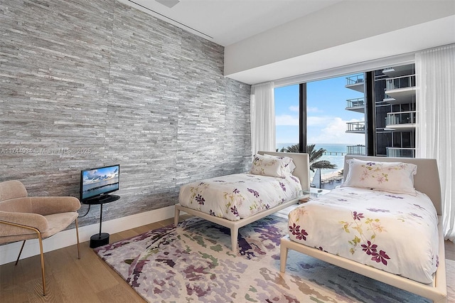 bedroom featuring hardwood / wood-style floors