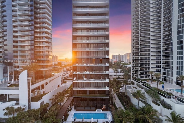 view of outdoor building at dusk