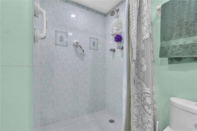 bathroom with toilet and walk in shower