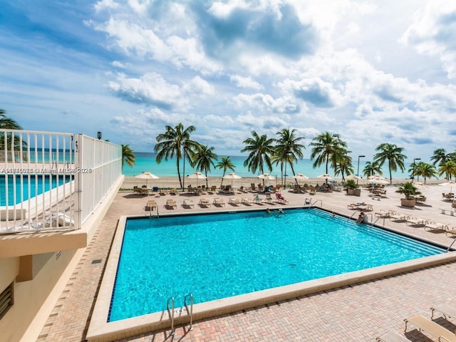 pool featuring a patio area