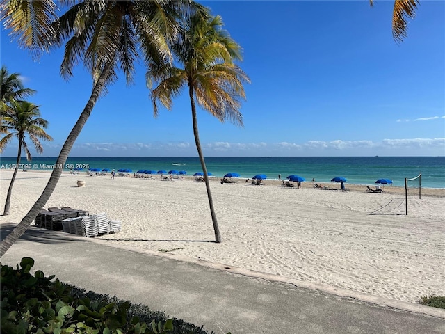 property view of water featuring a beach view