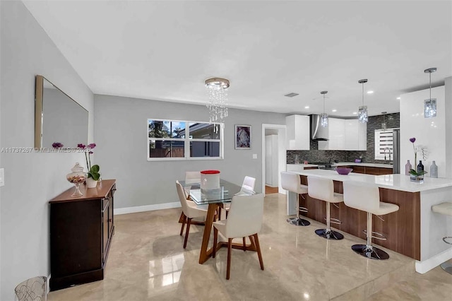 dining space featuring sink