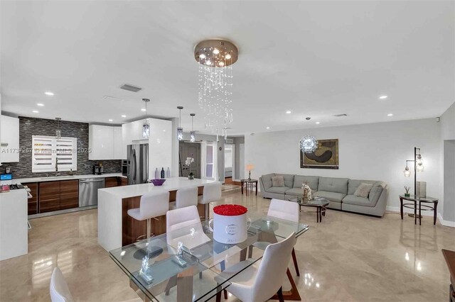 461 NE 115th St, Miami, FL 33161 - dining area featuring recessed lighting and baseboards