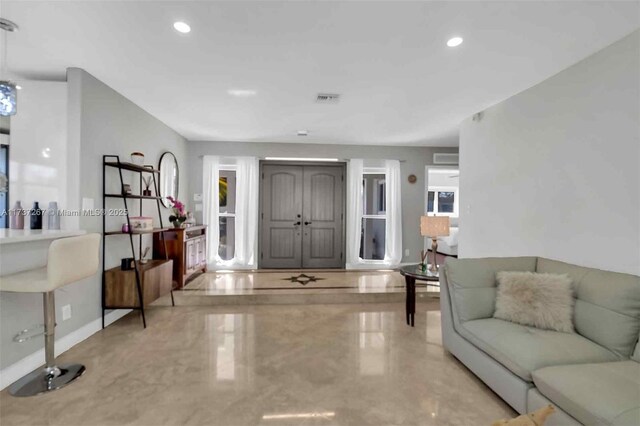 461 NE 115th St, Miami, FL 33161 - foyer featuring recessed lighting and baseboards