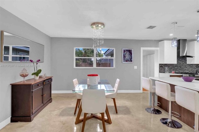 461 NE 115th St, Miami, FL 33161 - dining space with baseboards