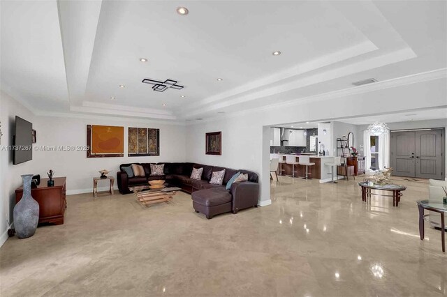 461 NE 115th St, Miami, FL 33161 - living area with a tray ceiling, baseboards, recessed lighting, and light marble finish flooring