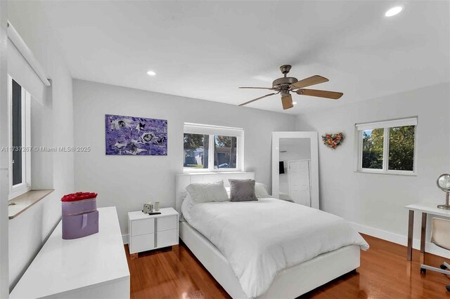 461 NE 115th St, Miami, FL 33161 - bedroom featuring recessed lighting, dark wood-style floors, a ceiling fan, and baseboards