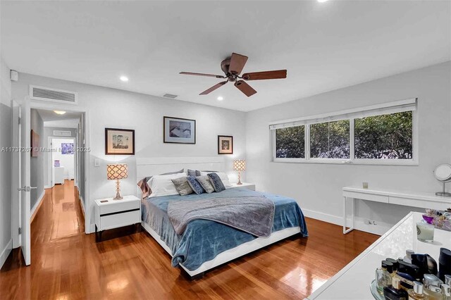 461 NE 115th St, Miami, FL 33161 - bedroom featuring wood finished floors, baseboards, recessed lighting, and a ceiling fan