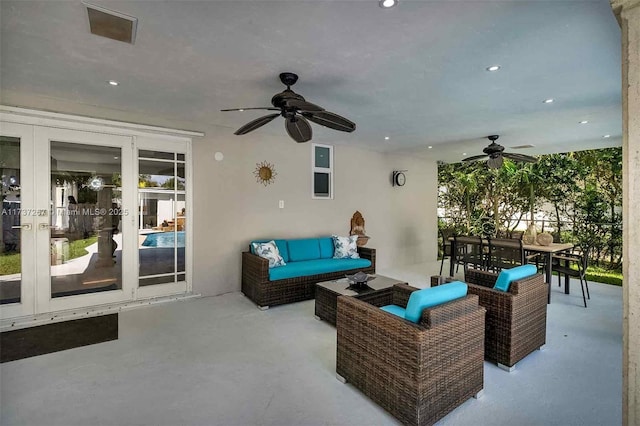 view of patio featuring outdoor lounge area, french doors, and ceiling fan