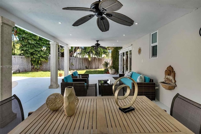 view of patio / terrace featuring an outdoor hangout area, ceiling fan, and french doors