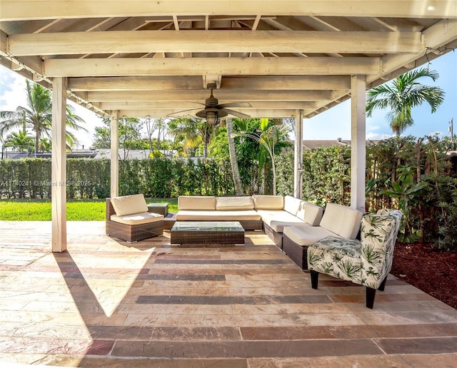 view of patio featuring an outdoor living space and ceiling fan