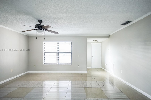 tiled empty room featuring ceiling fan, ornamental molding, and a textured ceiling