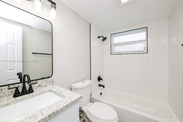 full bathroom featuring vanity, toilet, and tiled shower / bath combo