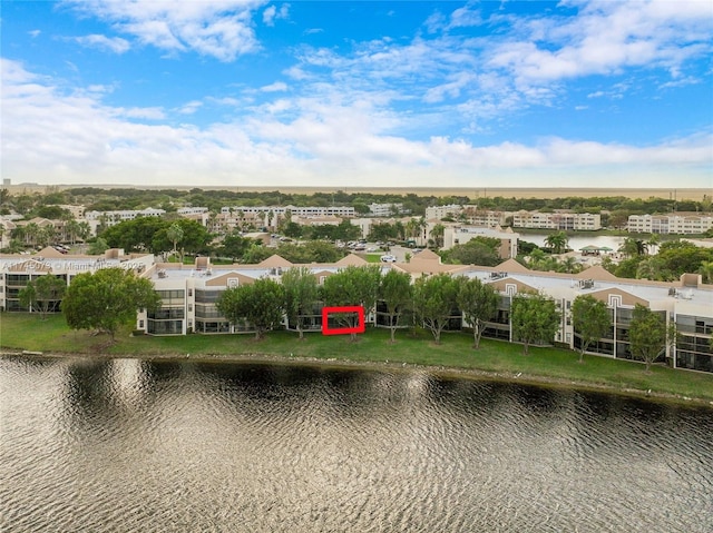 birds eye view of property featuring a water view