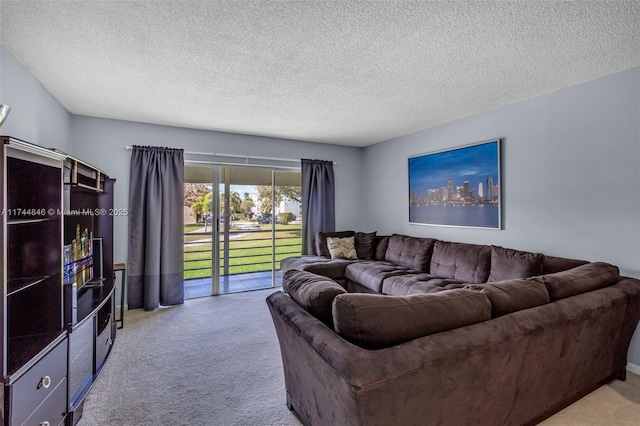 carpeted living room featuring a textured ceiling