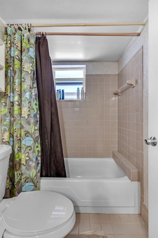 bathroom with shower / tub combo with curtain, toilet, and tile patterned flooring