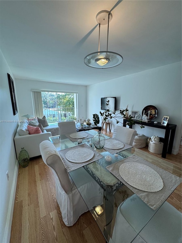 dining room featuring light wood-type flooring