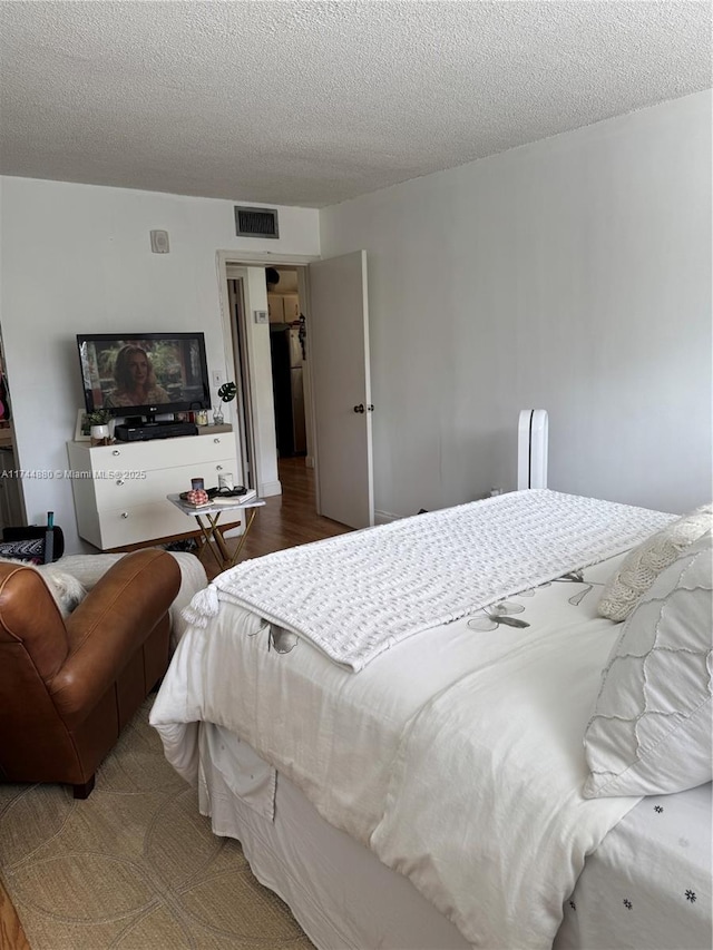 bedroom with a textured ceiling