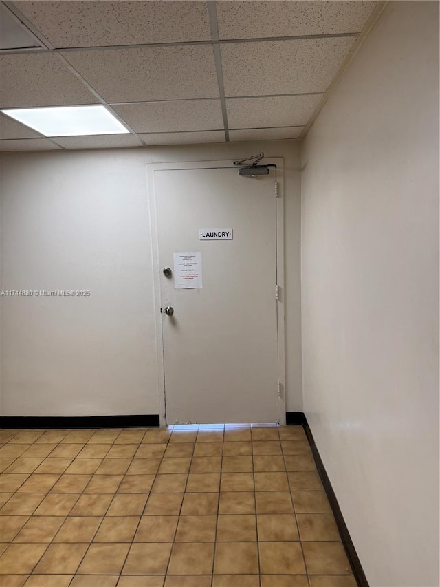 entryway featuring a paneled ceiling