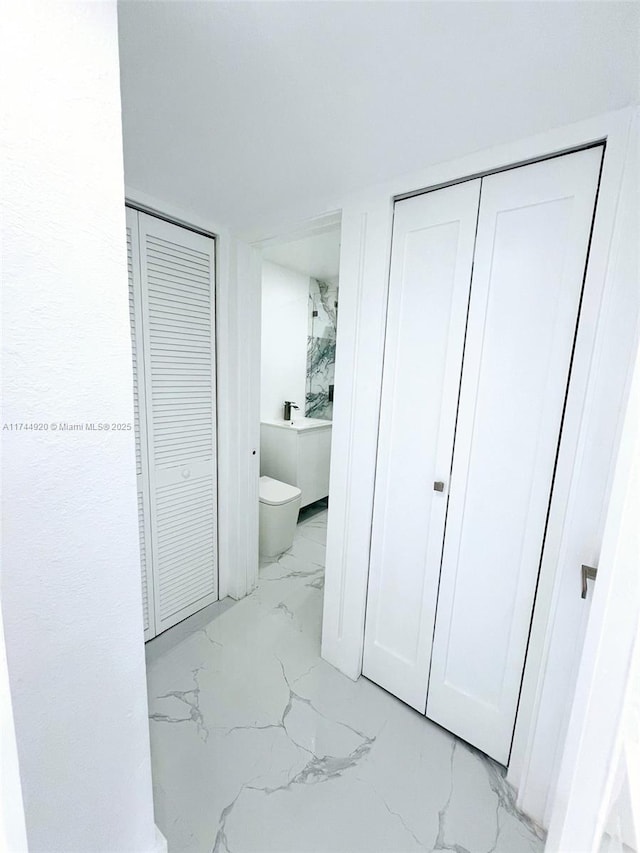 interior space with marble finish floor