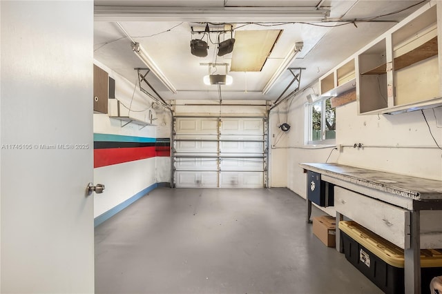 garage featuring a garage door opener