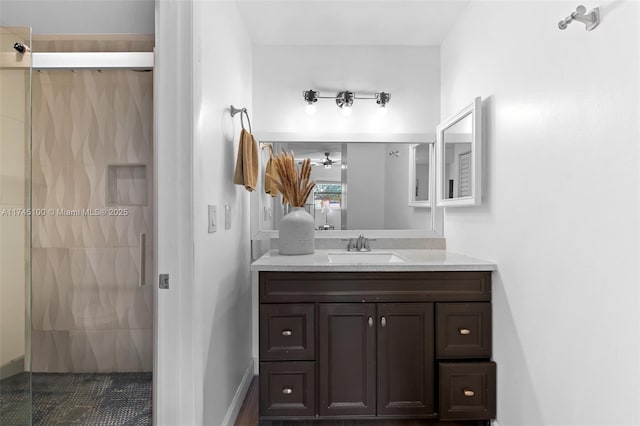 3005 NW 48th Ave Unit 3005, Coconut Creek, FL 33063 - full bath featuring a tile shower, vanity, and tile patterned flooring