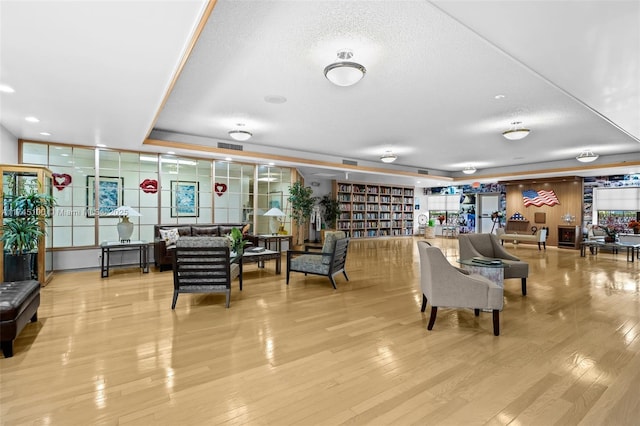 3005 NW 48th Ave Unit 3005, Coconut Creek, FL 33063 - community lobby featuring a textured ceiling