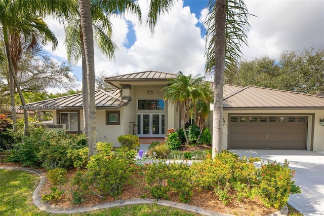 view of front of property featuring a garage