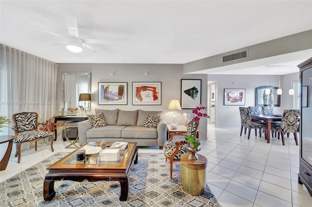 4000 NW 44th Ave Unit 405, Lauderdale Lakes, FL 33319 - living room with light tile patterned floors and ceiling fan