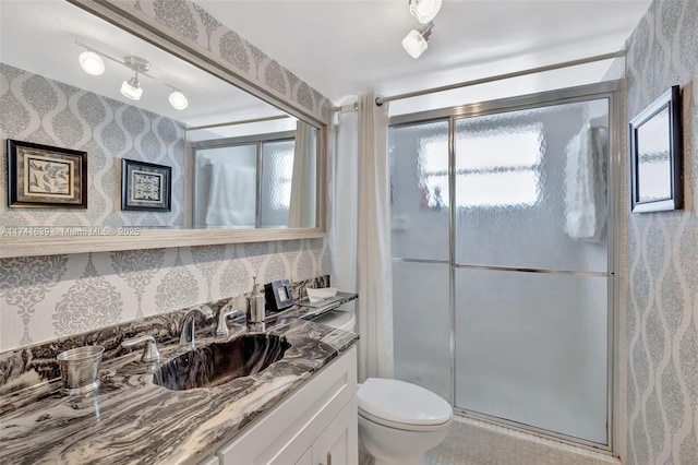 4000 NW 44th Ave Unit 405, Lauderdale Lakes, FL 33319 - bathroom with vanity, a shower with door, and toilet