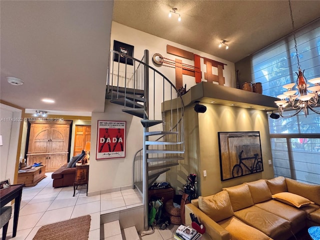 3007 NE 183rd Ln Unit 7, Aventura, FL 33160 - tiled living room featuring a notable chandelier and stairway