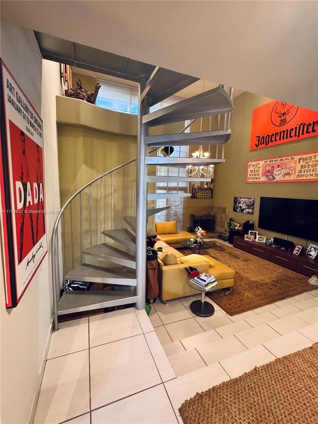 3007 NE 183rd Ln Unit 7, Aventura, FL 33160 - stairway featuring tile patterned floors and a fireplace