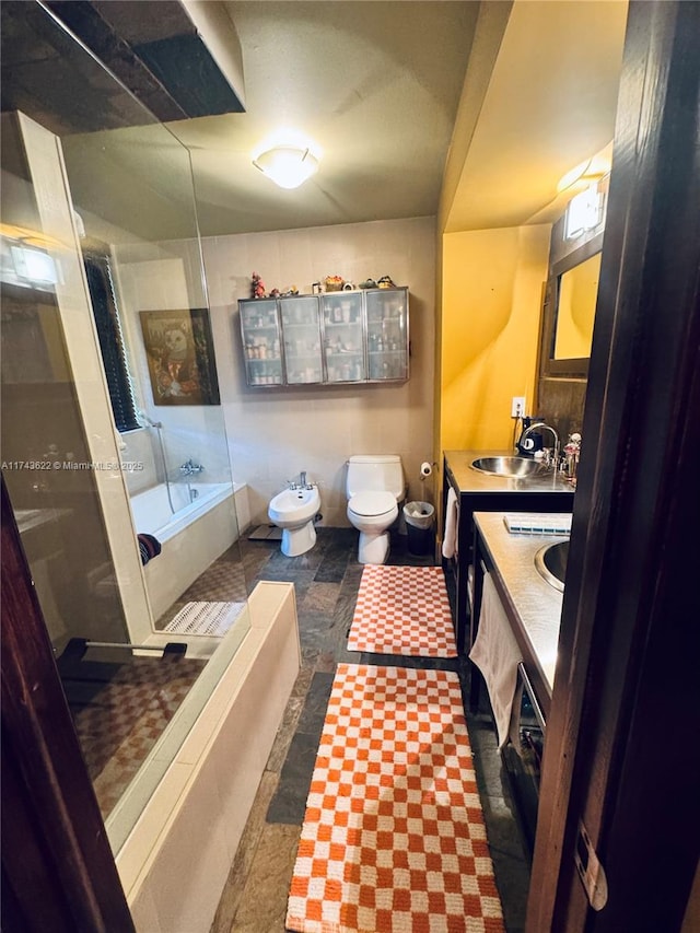3007 NE 183rd Ln Unit 7, Aventura, FL 33160 - bathroom featuring vanity, toilet, a shower, a bidet, and a bath